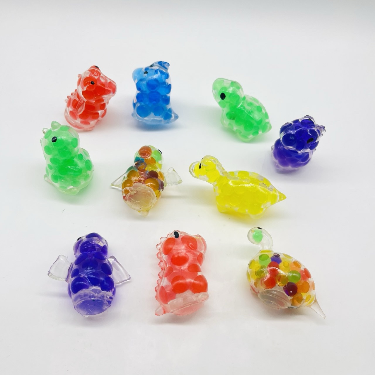 Dinosaurio Squishy Bead Animals en cápsula de 2 pulgadas, bolsa con 200 pz.