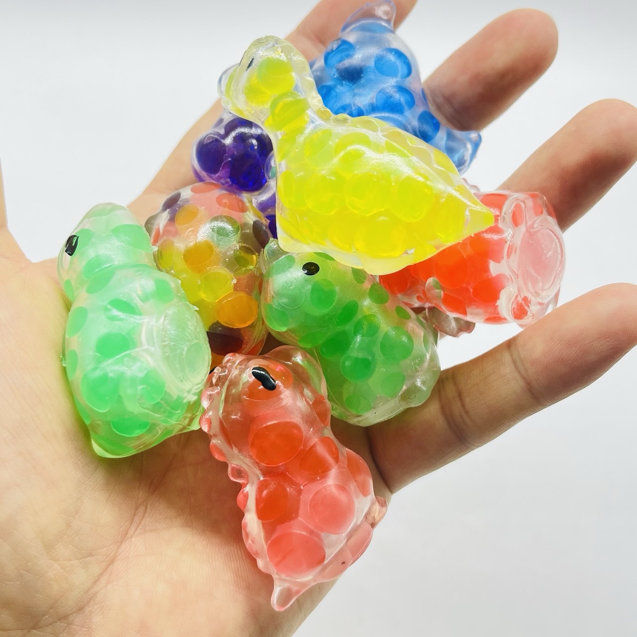 Dinosaurio Squishy Bead Animals en cápsula de 2 pulgadas, bolsa con 200 pz.